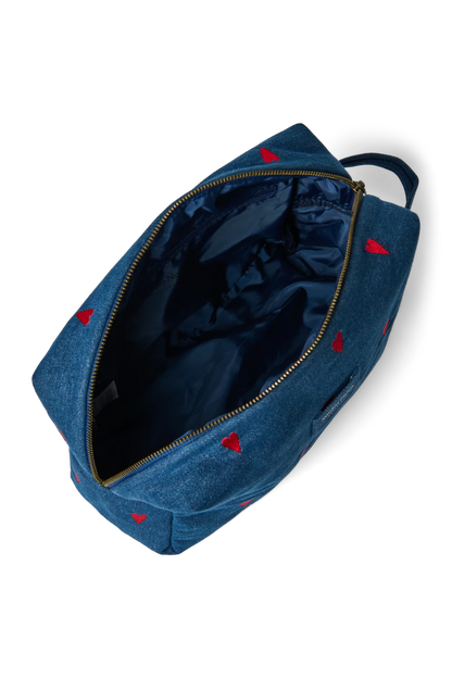 Innenansicht der Studio Noos Denim Kosmetiktasche mit dunkelblauem, glänzendem Futter