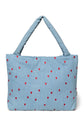 Wattierte Kinderwagentasche aus besticktem Denim von Studio Noos.