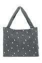 Wattierte Kinderwagentasche aus besticktem Jeansstoff von Studio Noos.