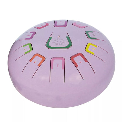 Die Zungentrommel von juegaconmigo mit Aufbewahrungstasche, Trommelstöcken, Trommelstockhalter, Fingerpicks und Notenbuch zum Aufstellen. 