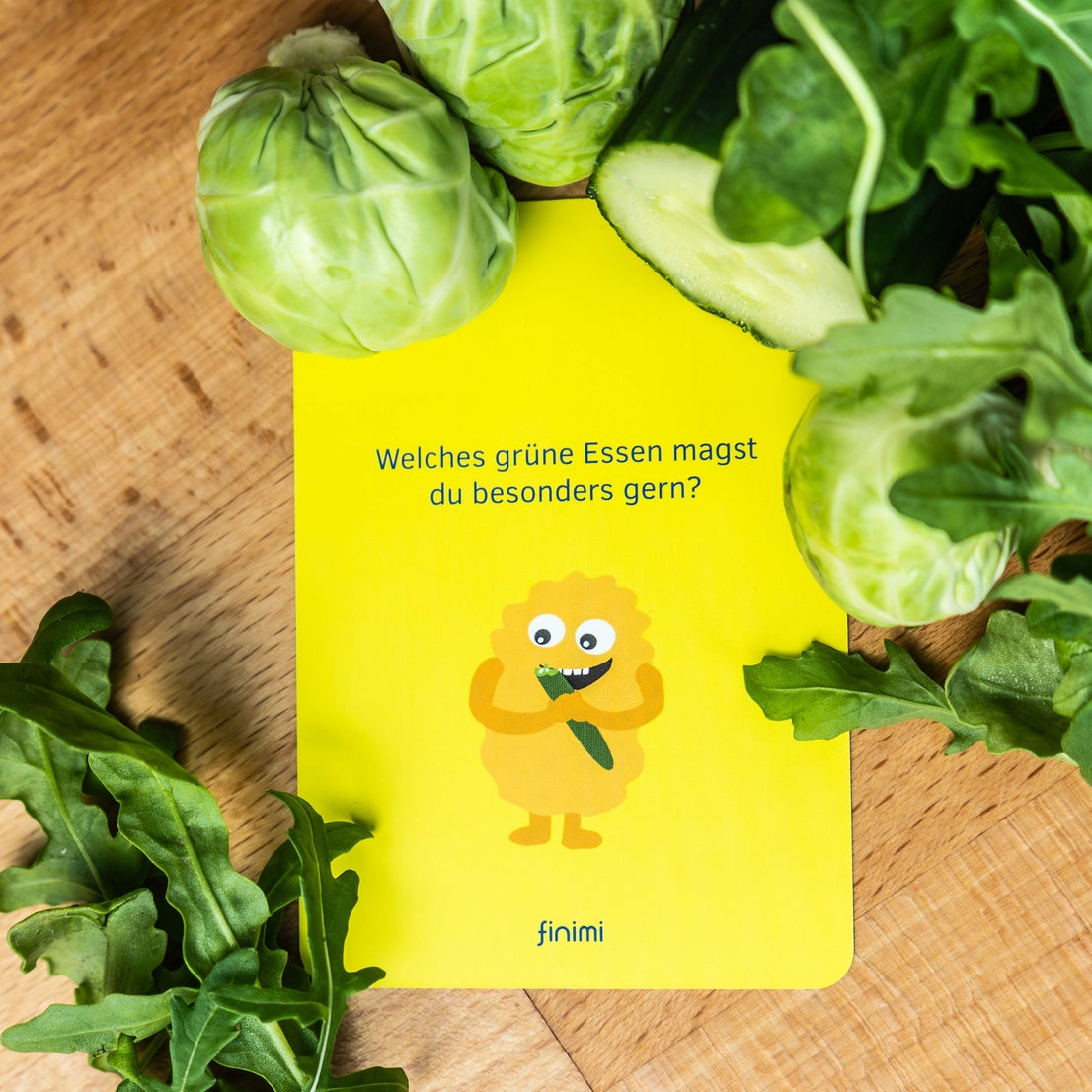 Gelbe Fragenkarte aus dem finimi Ask &amp; Task Kartenset für Kinder mit Beispielfrage