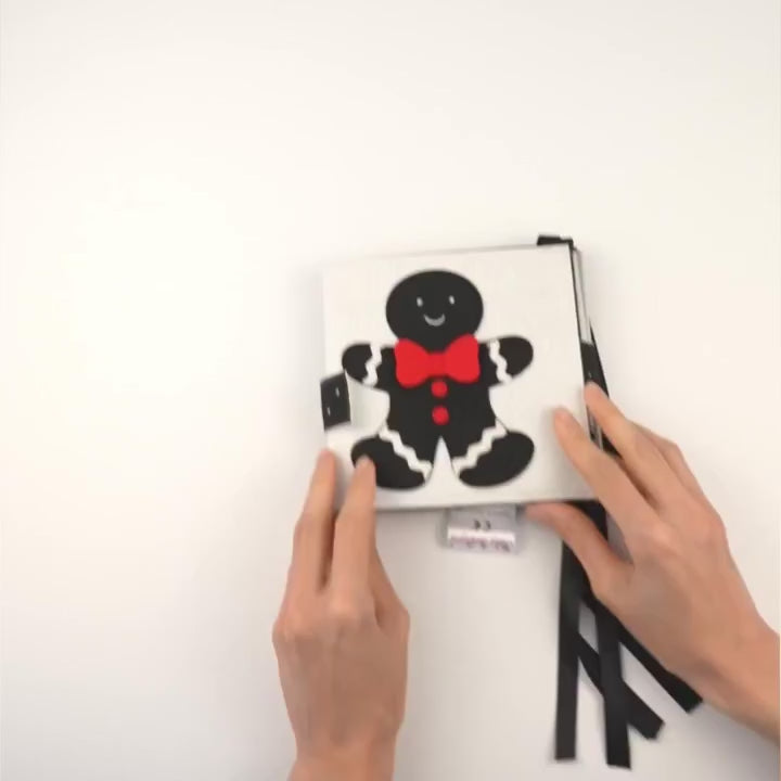 Baby Faltbuch Farbfunken schwarz weiß mit Farbakzenten aus Filz Jolly Designs