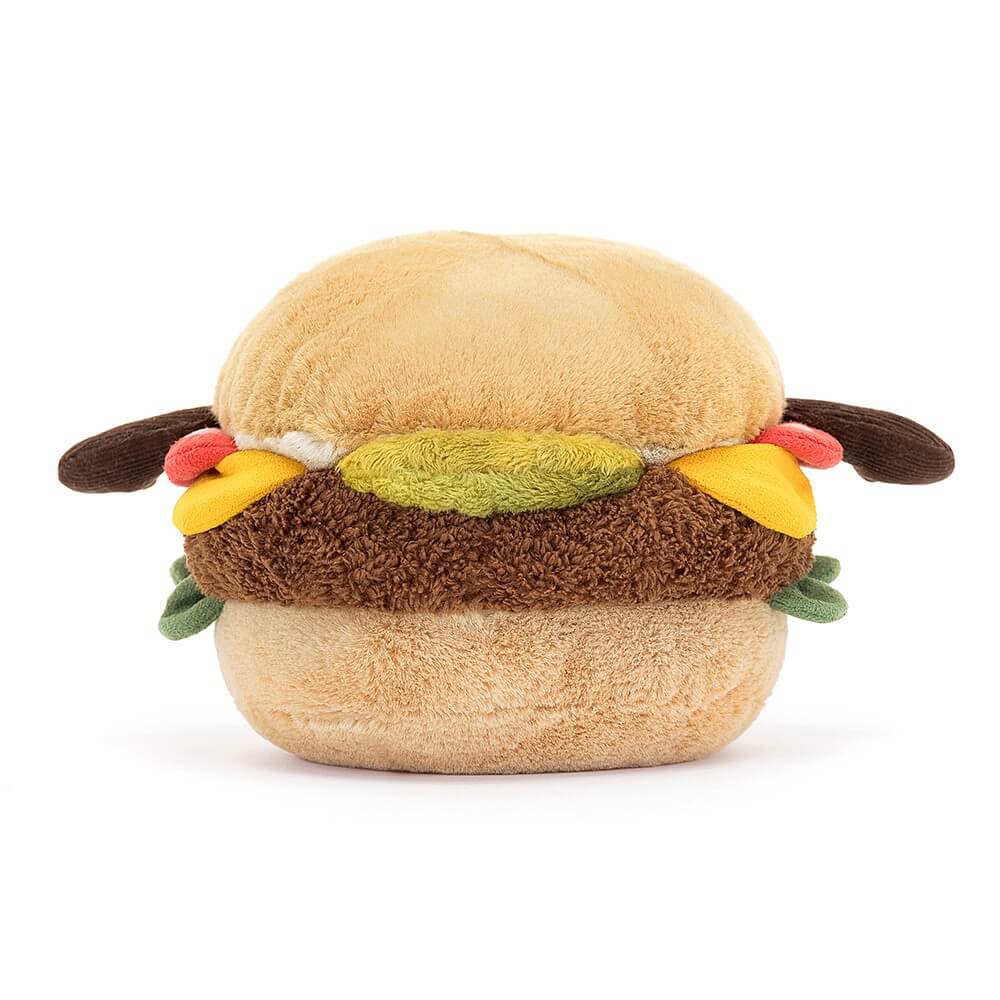 Rückansicht: Jellycat Amuseables Burger – sitzendes Burger-Kuscheltier mit Brötchen, Salat, Käse, Burger-Patty, Tomate, Gurke, braunen Füßchen und lachendem Gesicht mit schwarzen Knopfaugen.