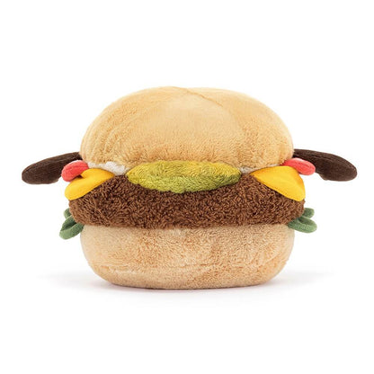 Rückansicht: Jellycat Amuseables Burger – sitzendes Burger-Kuscheltier mit Brötchen, Salat, Käse, Burger-Patty, Tomate, Gurke, braunen Füßchen und lachendem Gesicht mit schwarzen Knopfaugen.